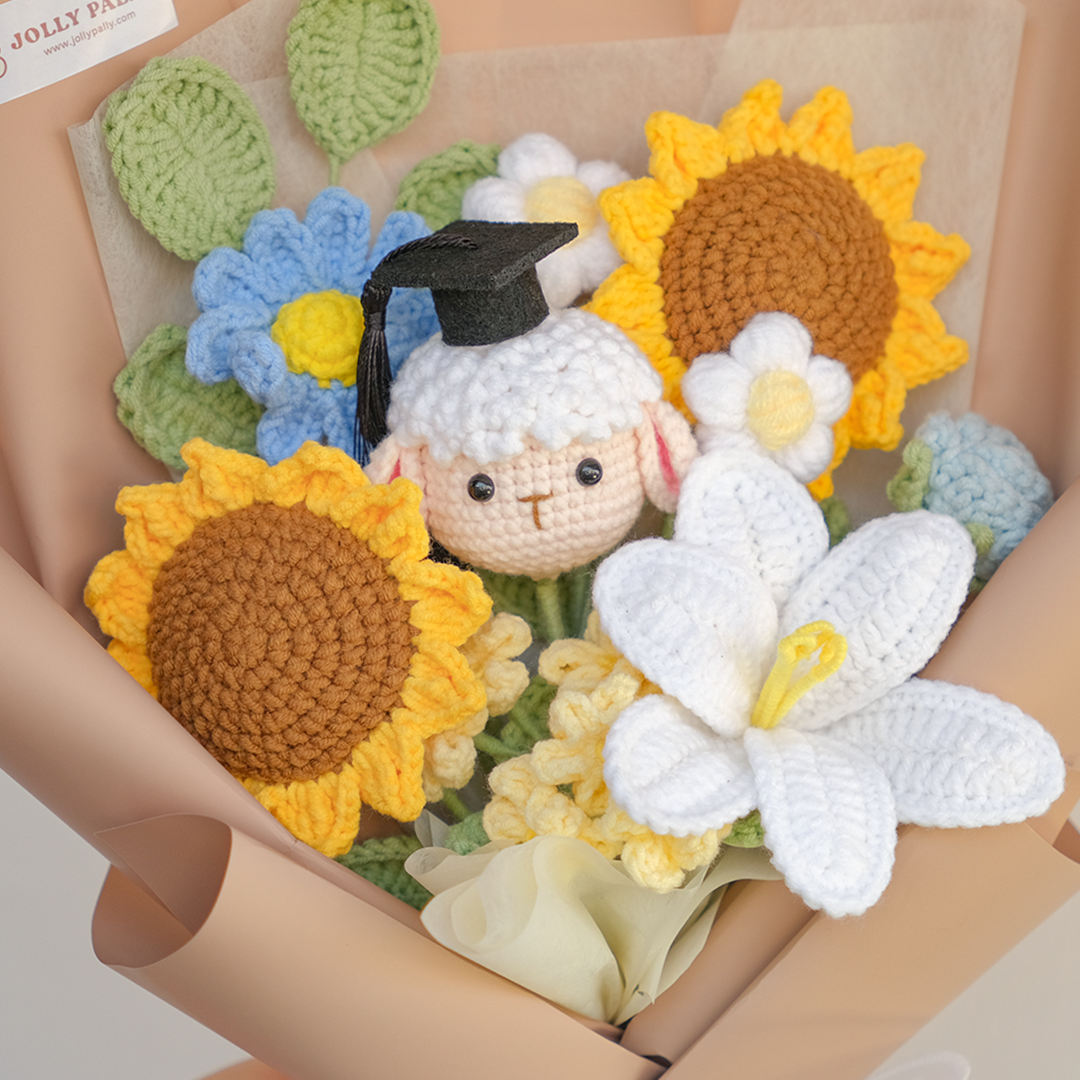 crochet sheep with graduation hat and sunflower bouquet