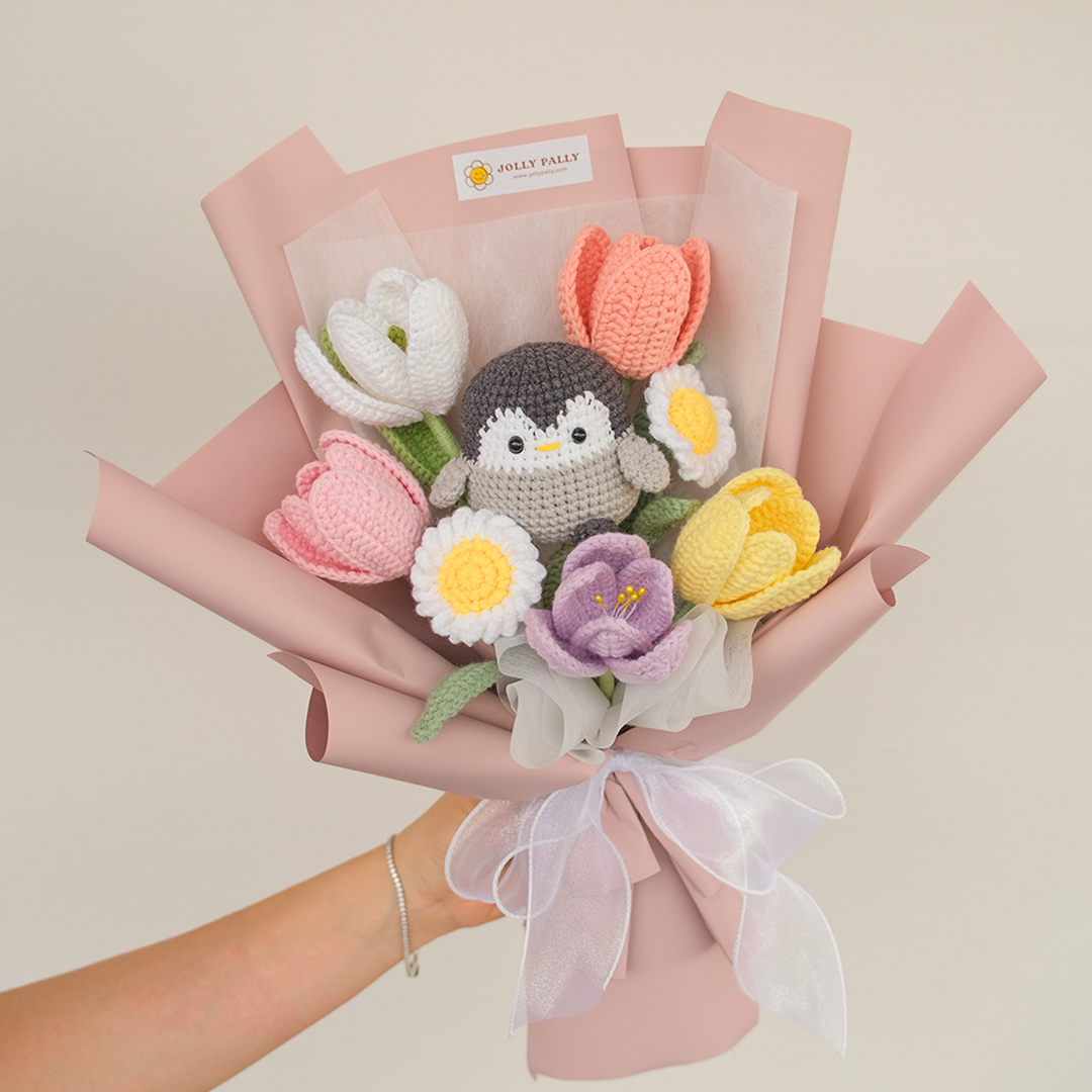 crochet penguin with pairing crochet flower bouquet