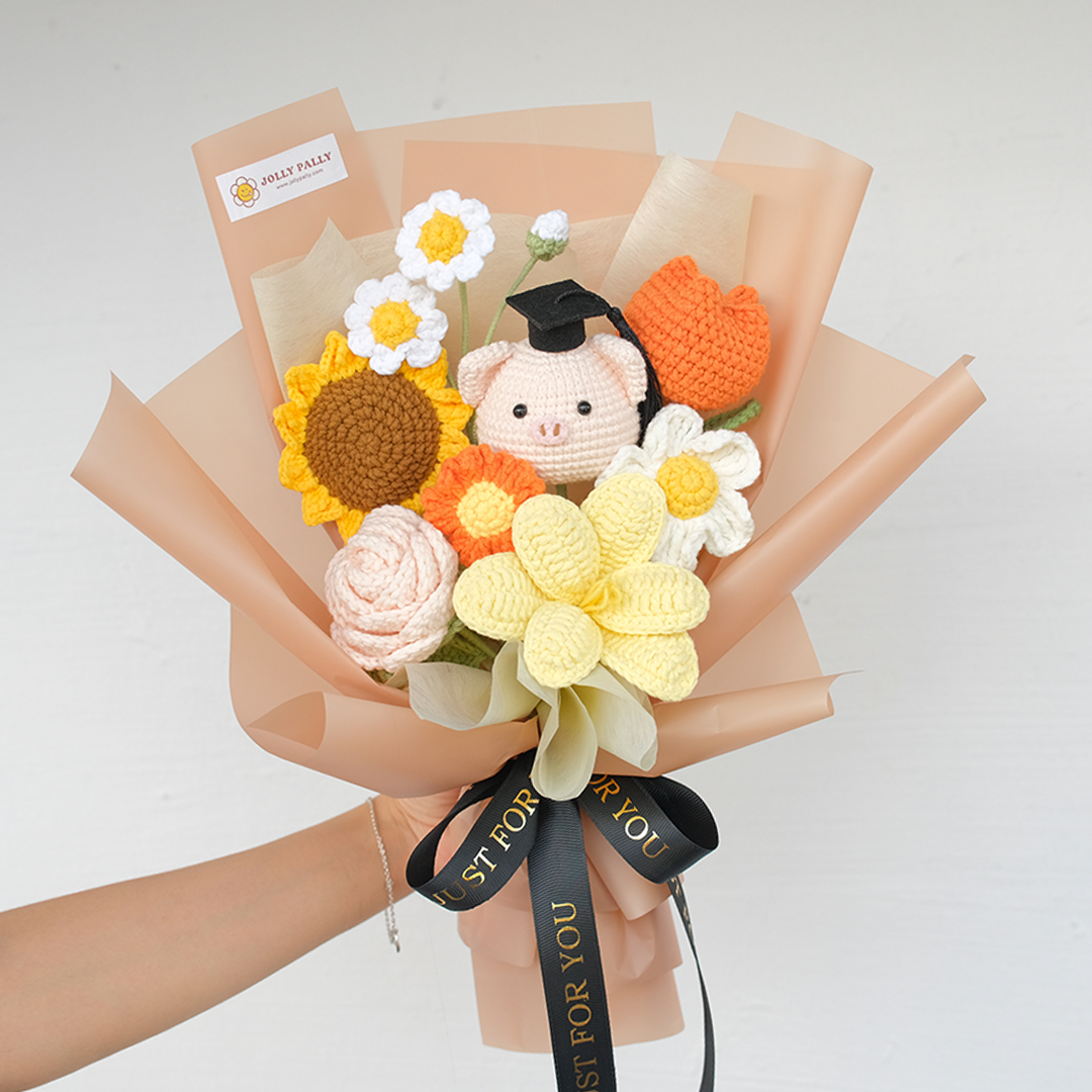 crochet sunflower bouquet with graduation pig